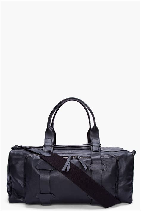 givenchy duffle bag all black|Givenchy black leather bag.